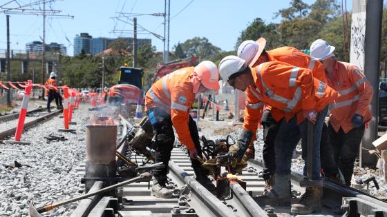 Workers undertaking track maintenance