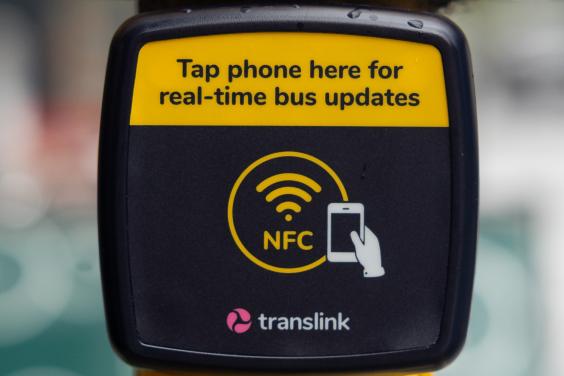 Close up of NFC reader at bus stop